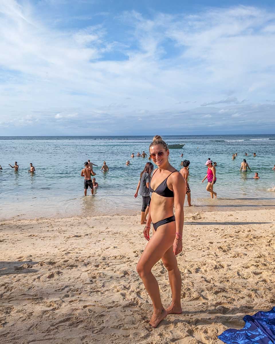 Bailey poses for a photo on Padang Beach in Uluwatu, Bali