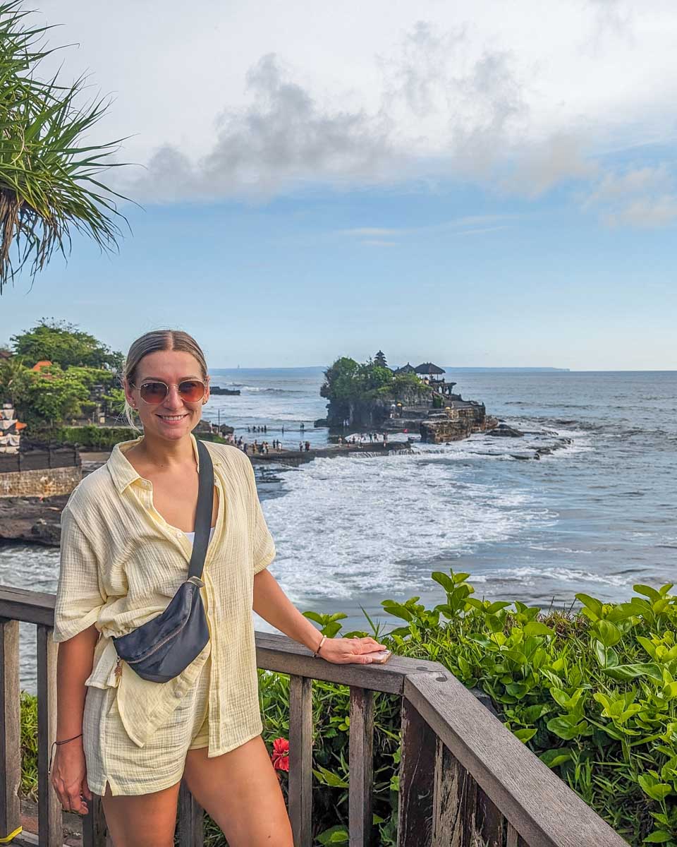 Bailey poses for a photo overlook the Tanah Lot Temple in Bali