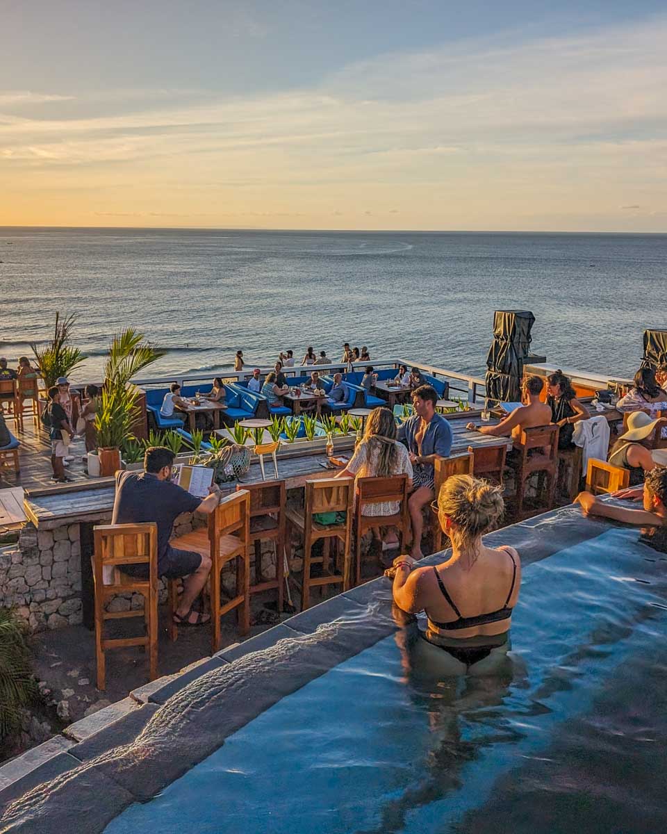 Bailey watches the sunset from the pool at Single Fin in Bali