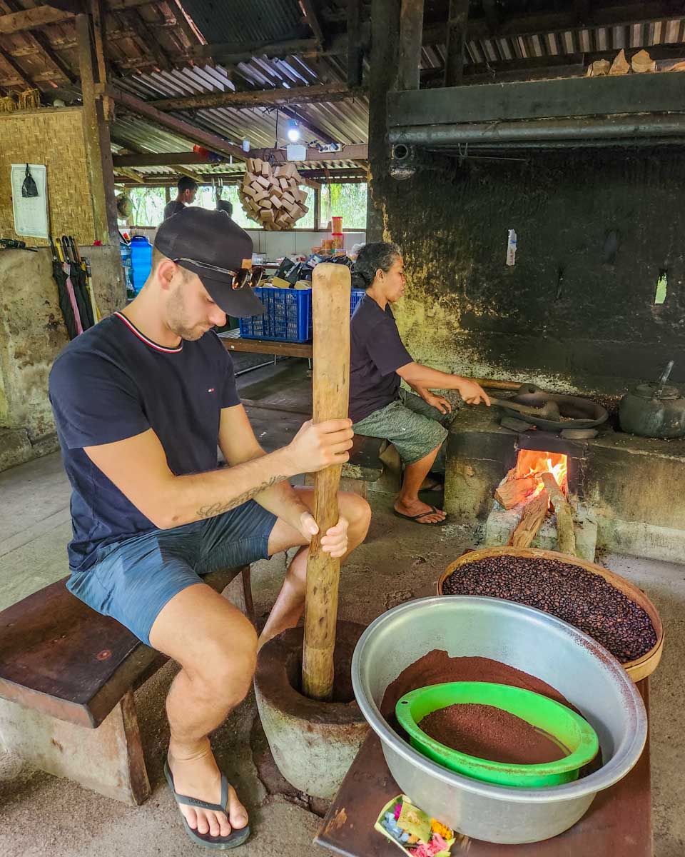 Daniel grinds coffee down at a coffee plantation in Bali