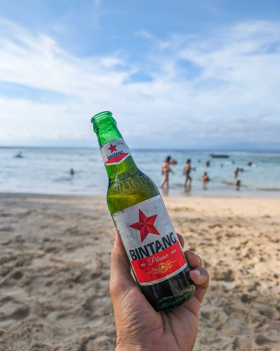 Having a Bintang at Padang Beach in Uluwatu, Bali