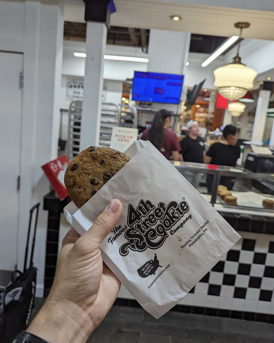 Holding a 4th street cookie at Reading Terminal Market Philadelphia