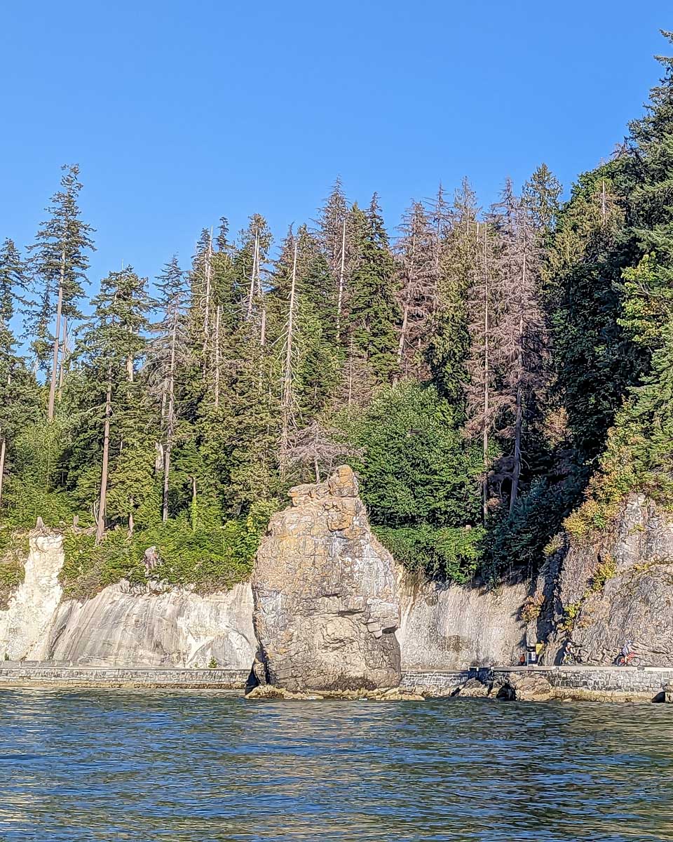 Looking at Siwash rock from the zodiac boat vancouver, canada