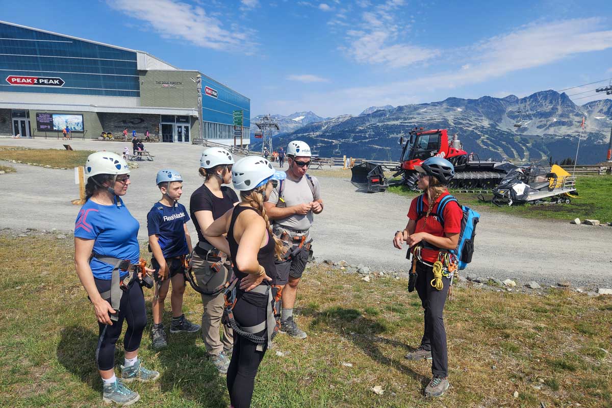 People getting a saftey briefing during Via Ferrata, Whistler, Canada