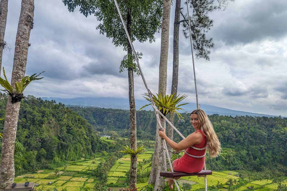 Bailey smiles on the jungle swing during the Bali Instagram tour