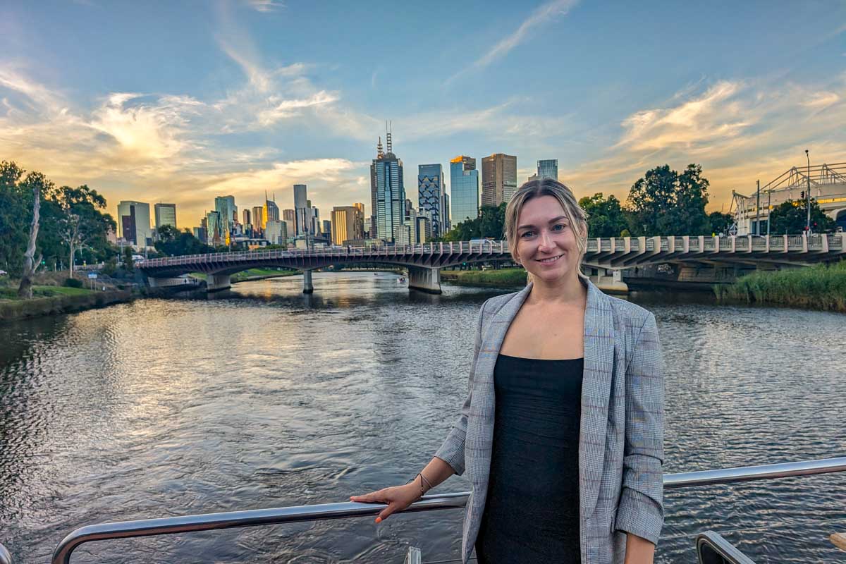 Bailey smiling on the deck of the spirit of melbourne dinner cruise