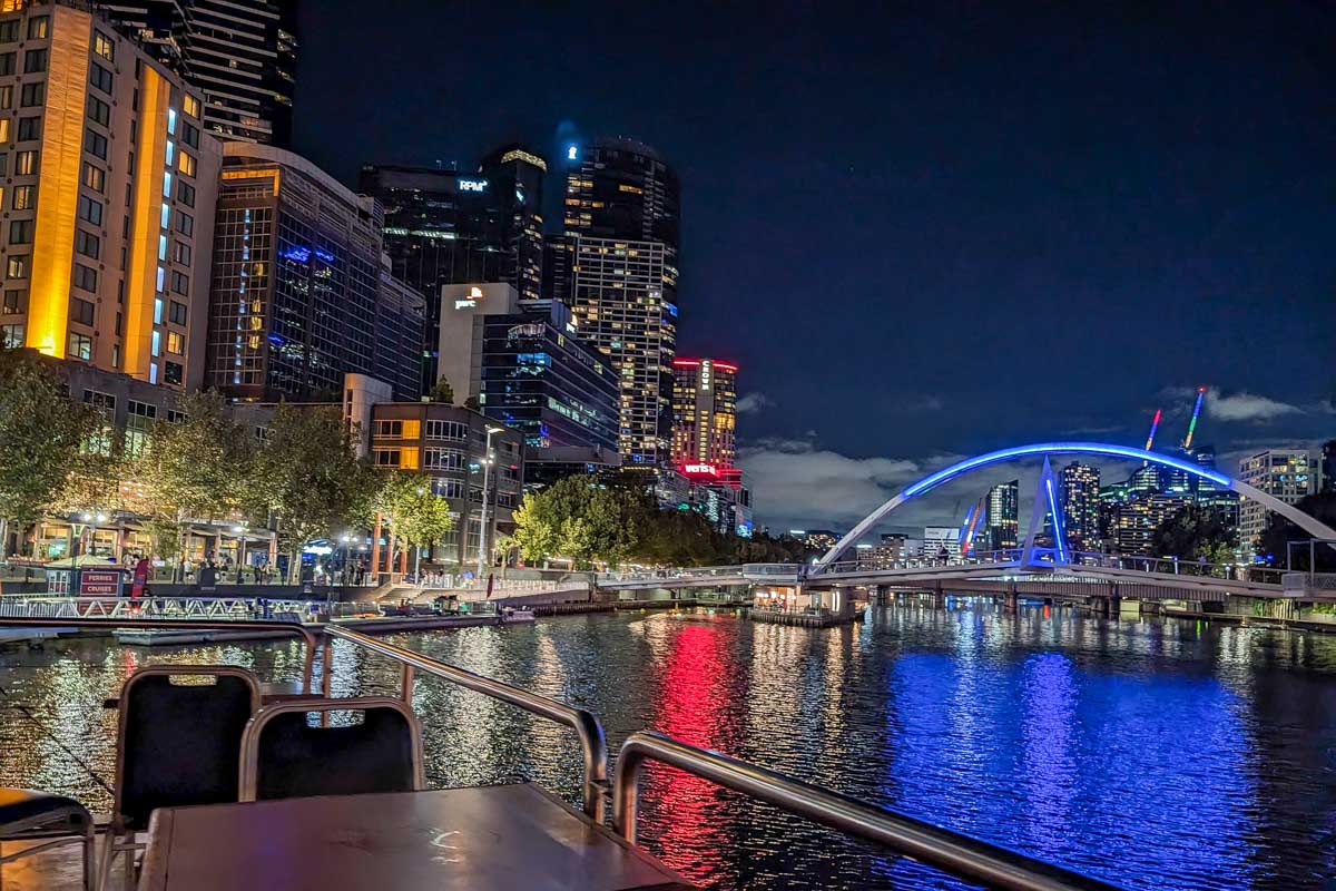 Melbourne and a bridge at night on the spirit of melbourne cruise
