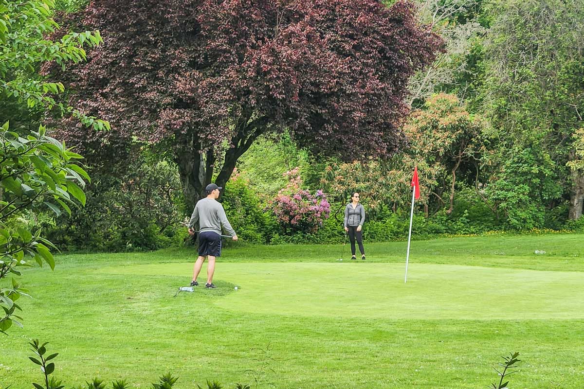 Two people play golf in Calgary