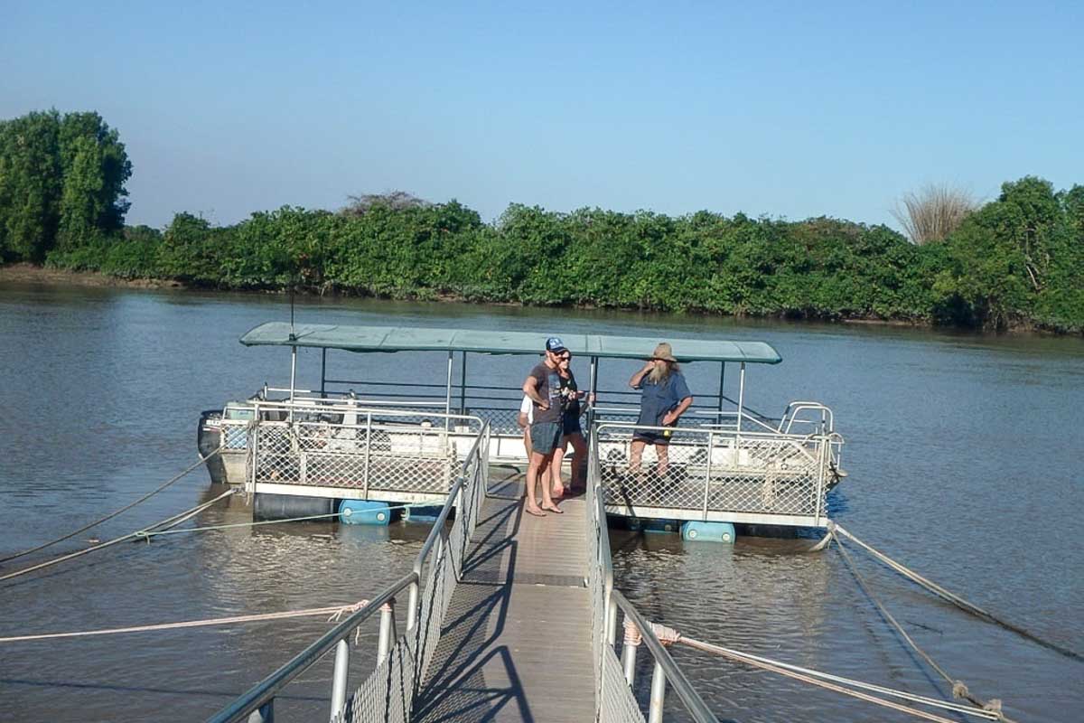 Bailey-and-Dan-talk-to-their-jumping-croc-cruis-guide-in-front-of-the-boat