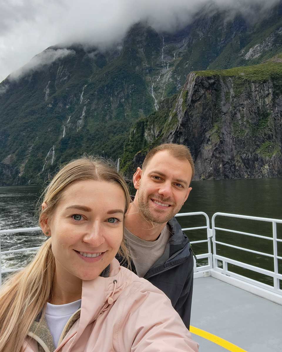 Bailey and Daniel take a selfie on a Milford Sound cruise New Zealand