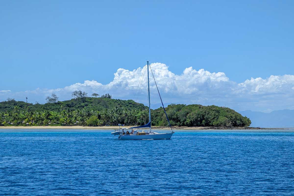 A boat in the water seen while on a multi day cruise in Fiji