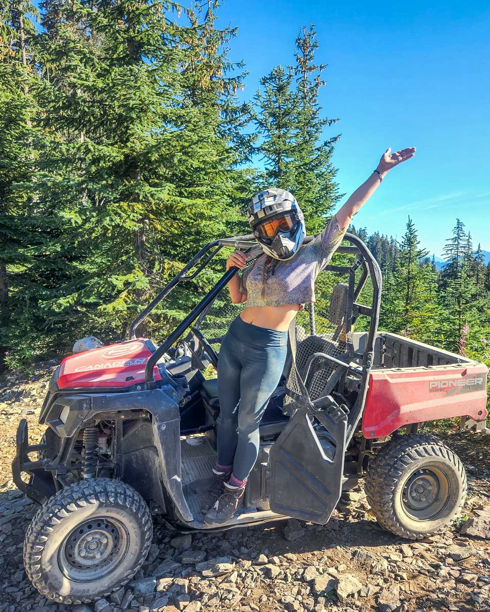 Bailey poses on an atv tour in whistler canada on a get your guide tour