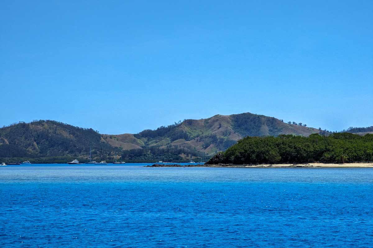 View of an island from a boat on a multi day cruise fiji