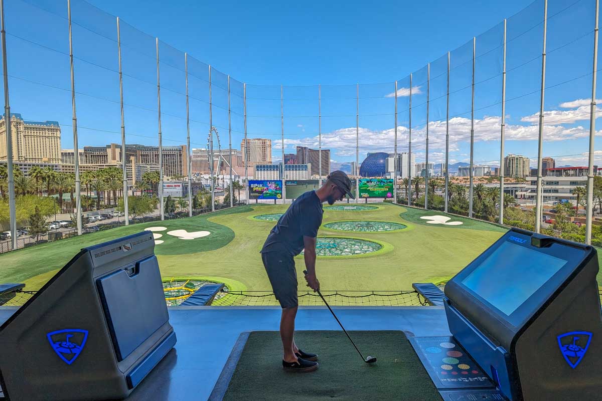A man golfing at Top Golf in Las Vegas USA