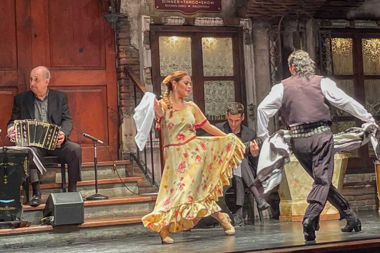 An older couple tango at La Ventana Buenos Aires Argentina