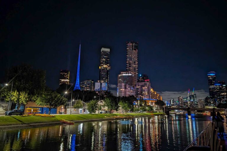 Melbourne lit up on the Yarra river at night in Melbourne Australia