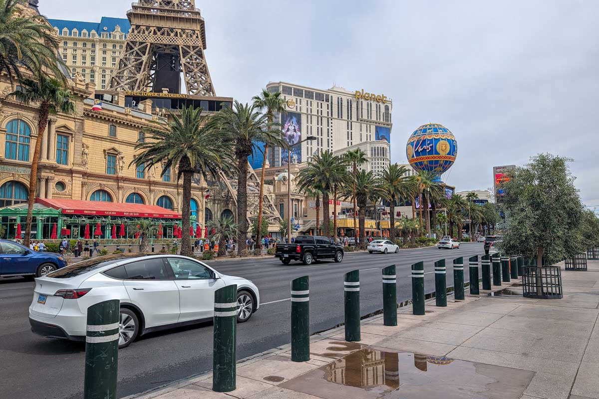 Photo of the Las Vegas strip with the eiffel tower and planet casino in the background in Las Vegas USA