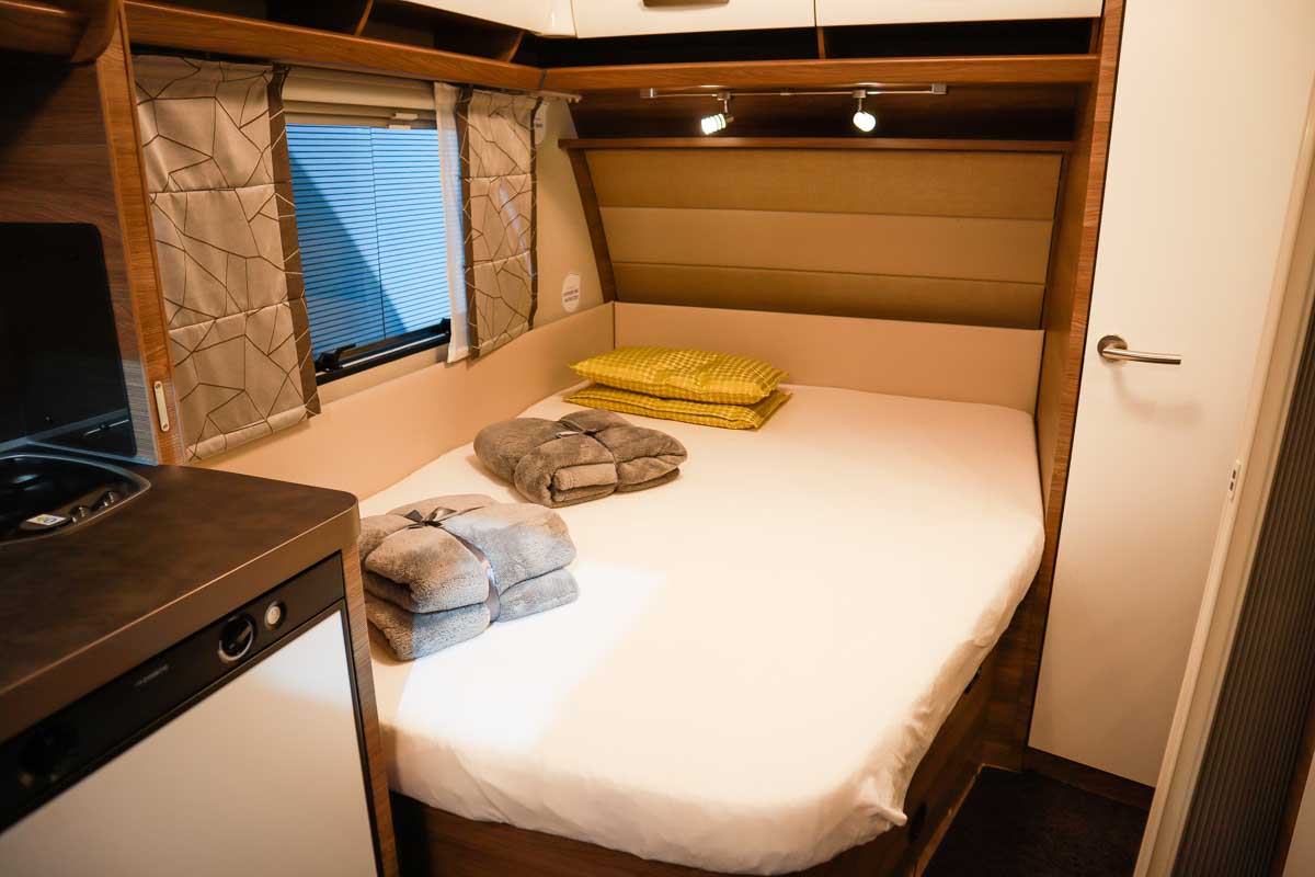A bed inside of a motorhome Australia