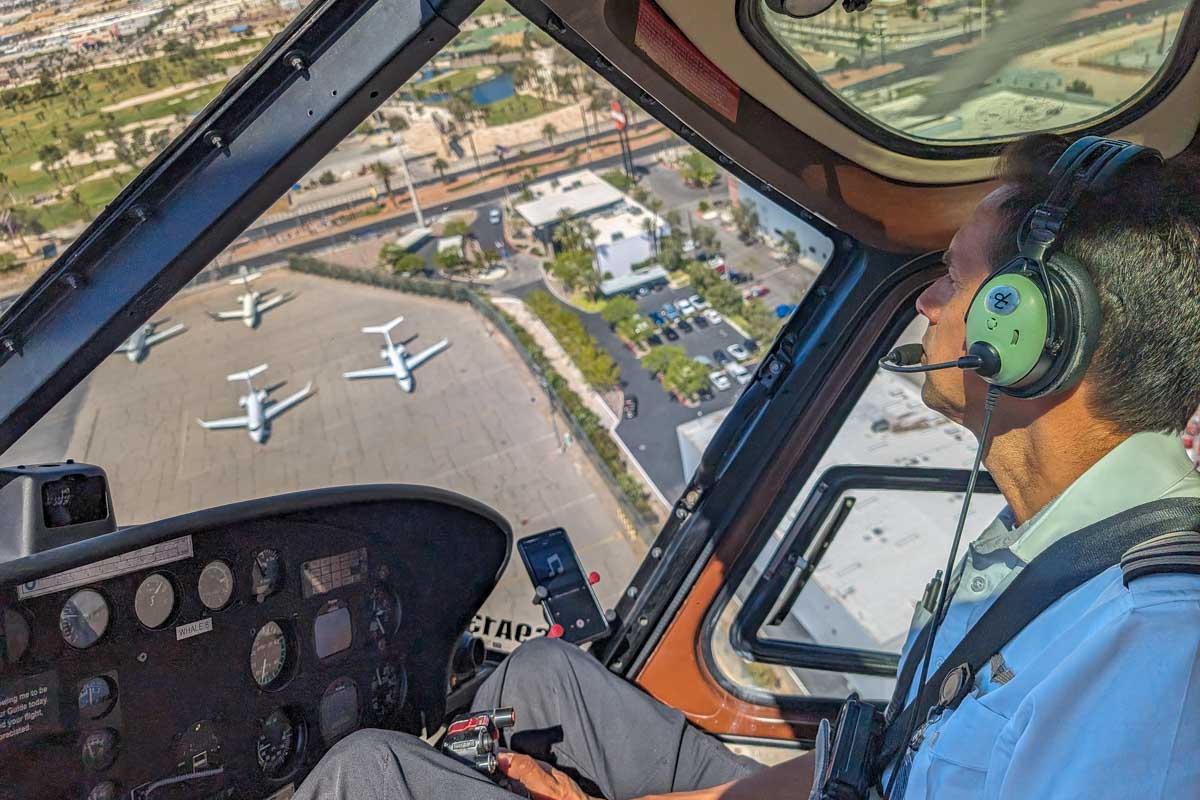 A helicopter flies over the airport on a tour to the grand canyon from las vegas USA