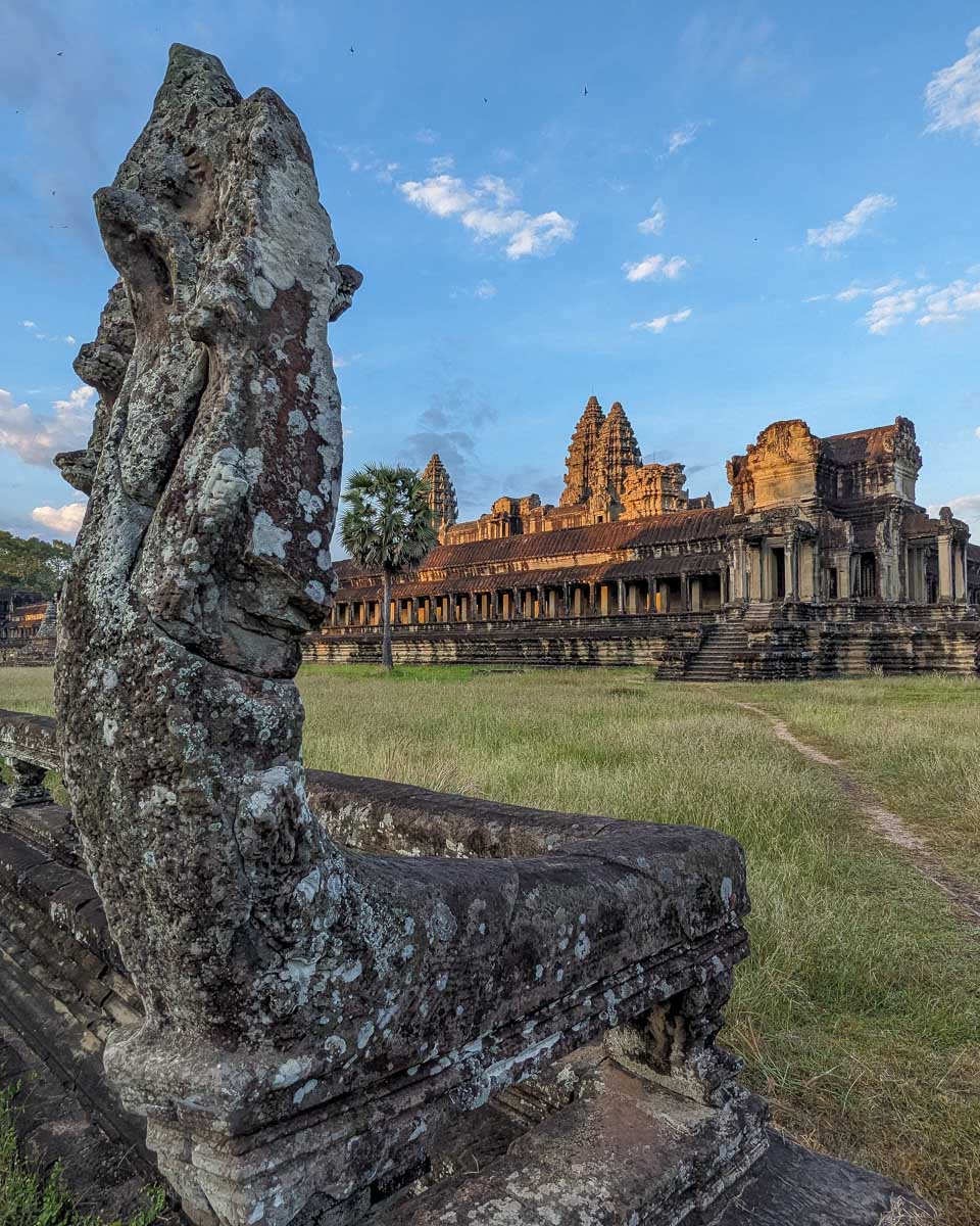 A worn down statue at the back of Angkor Wat Temple after sunrise Siem Reap Cambodia-2