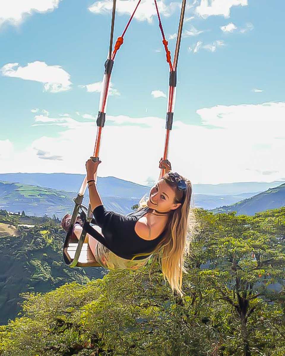 Bailey on the edge of the world swing near banos ecuador