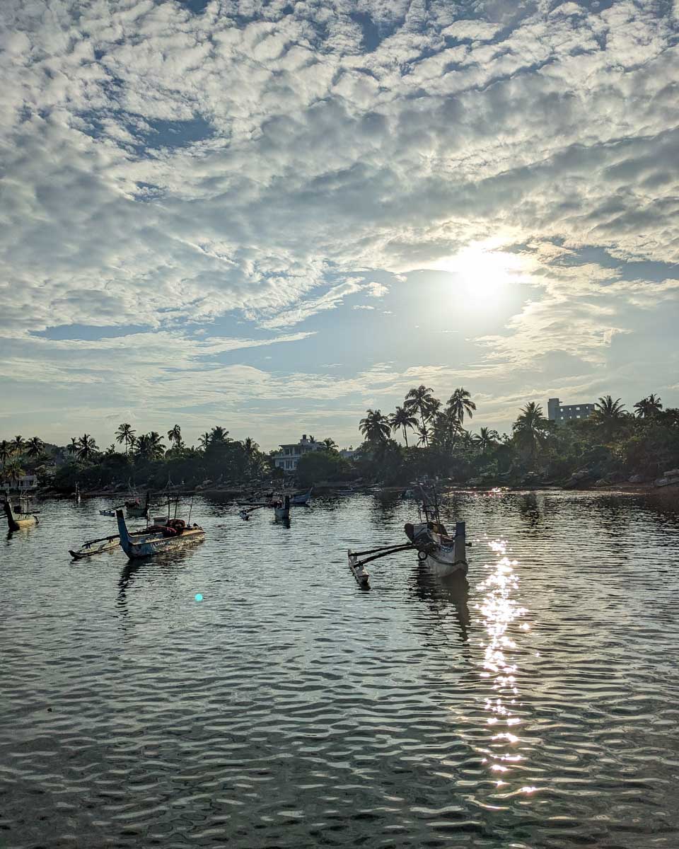 Boats fishing on a whale watching tour in Mirrisa Sri Lanka