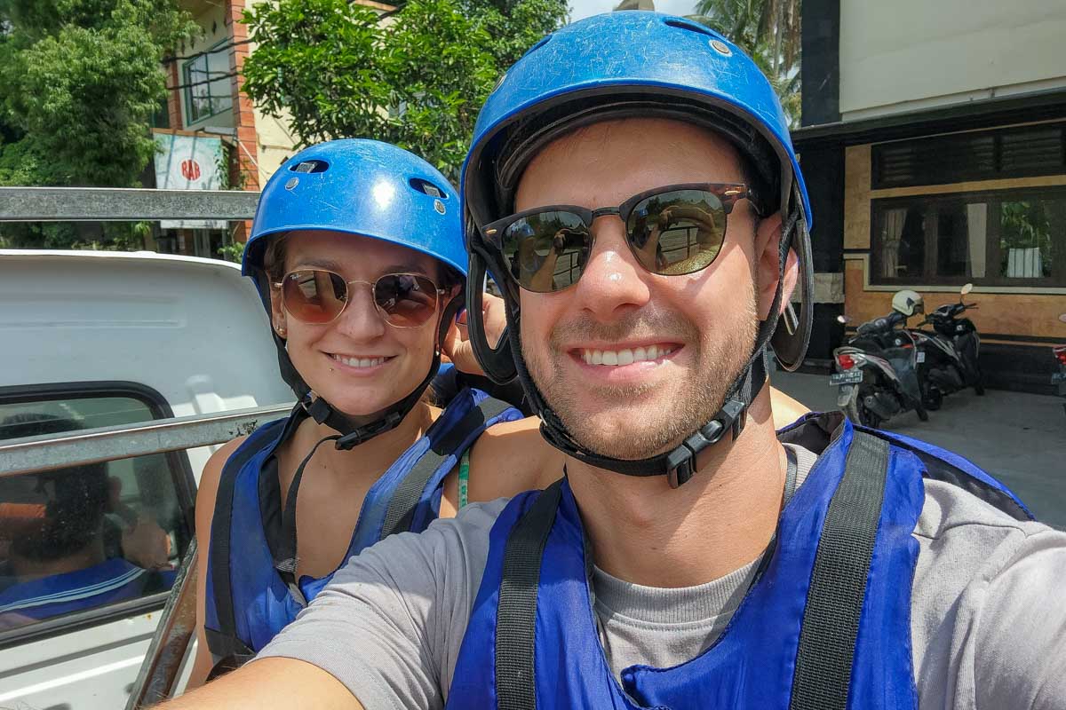 Daniel and Bailey smile in rafting gear on a trip in Bali