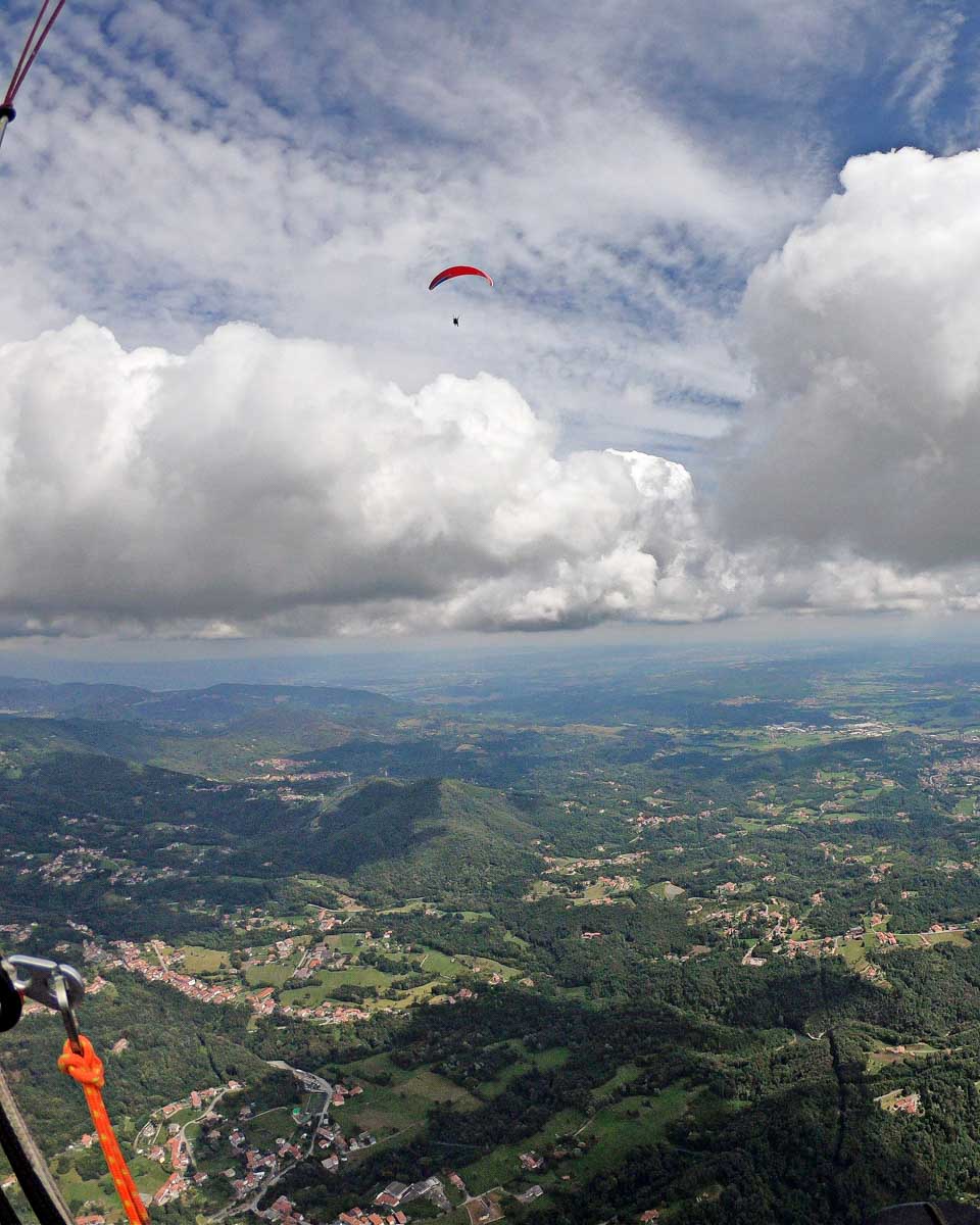 First person look from a paraglider over Medellin Colombia