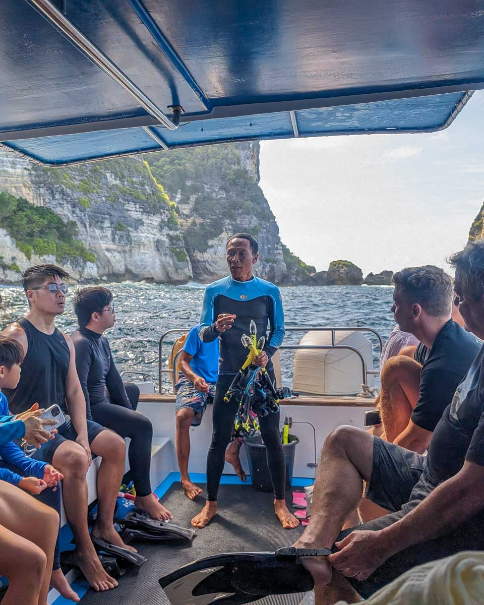 People on a boat getting ready to snorkel on a tour to Nusa Penida Bali
