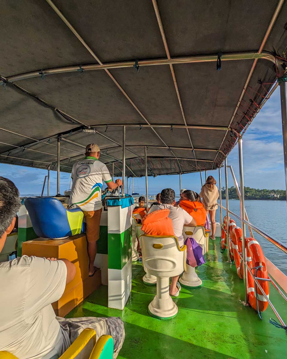 People on the top deck of the boat on a whale watching tour in Mirrisa Sri Lanka