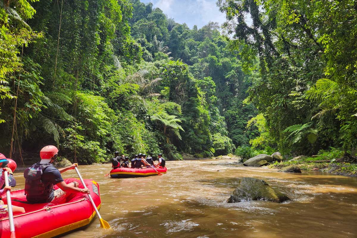 People rafting down a river in Bali on an ATV tour-2