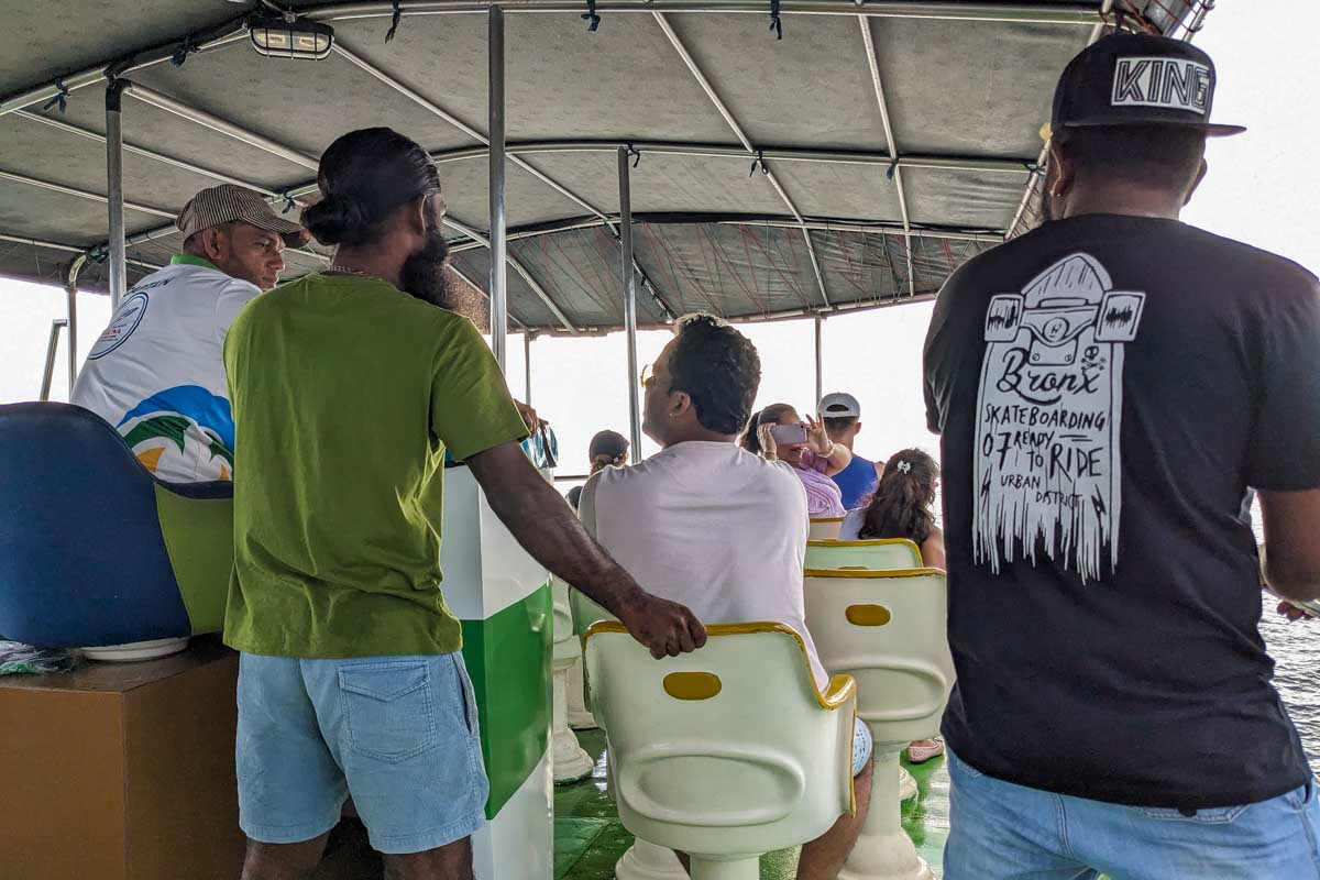 Staff on the boat on a whale watching tour in Mirrisa Sri Lanka