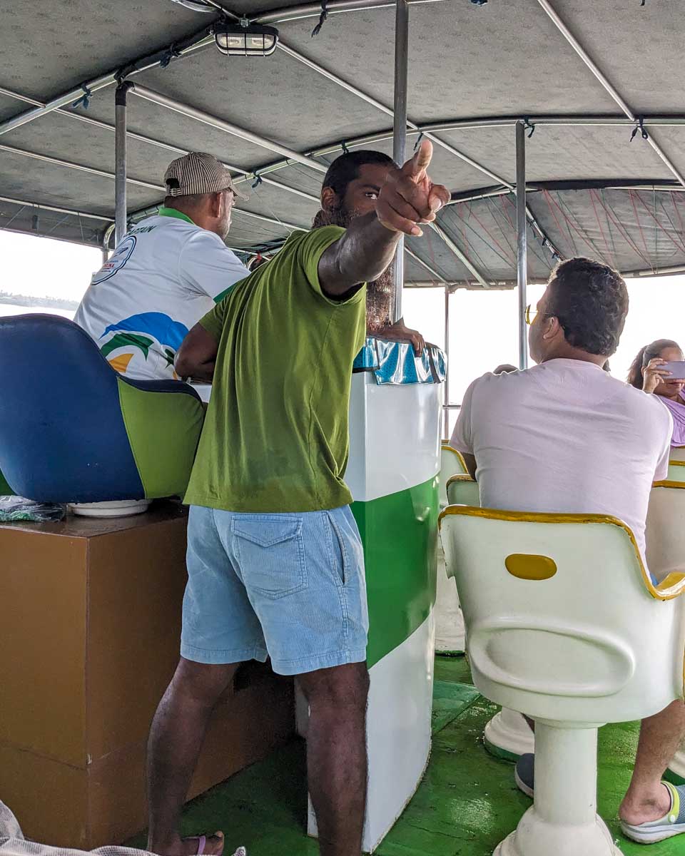The captain of the boat on a whale watching tour in Mirrisa Sri Lanka