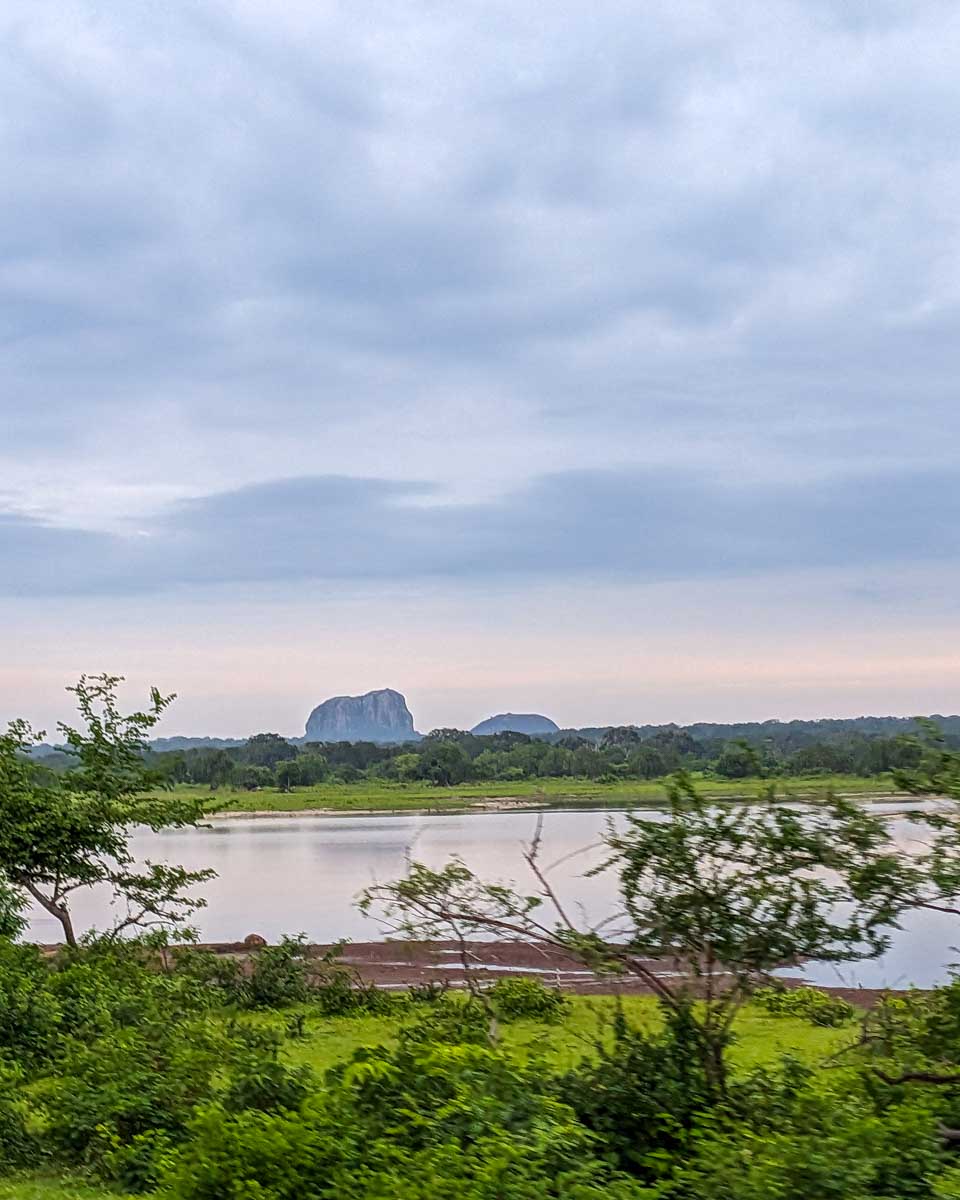 Yala National Park at sunrise with elephant mountain in the background Sri Lanka