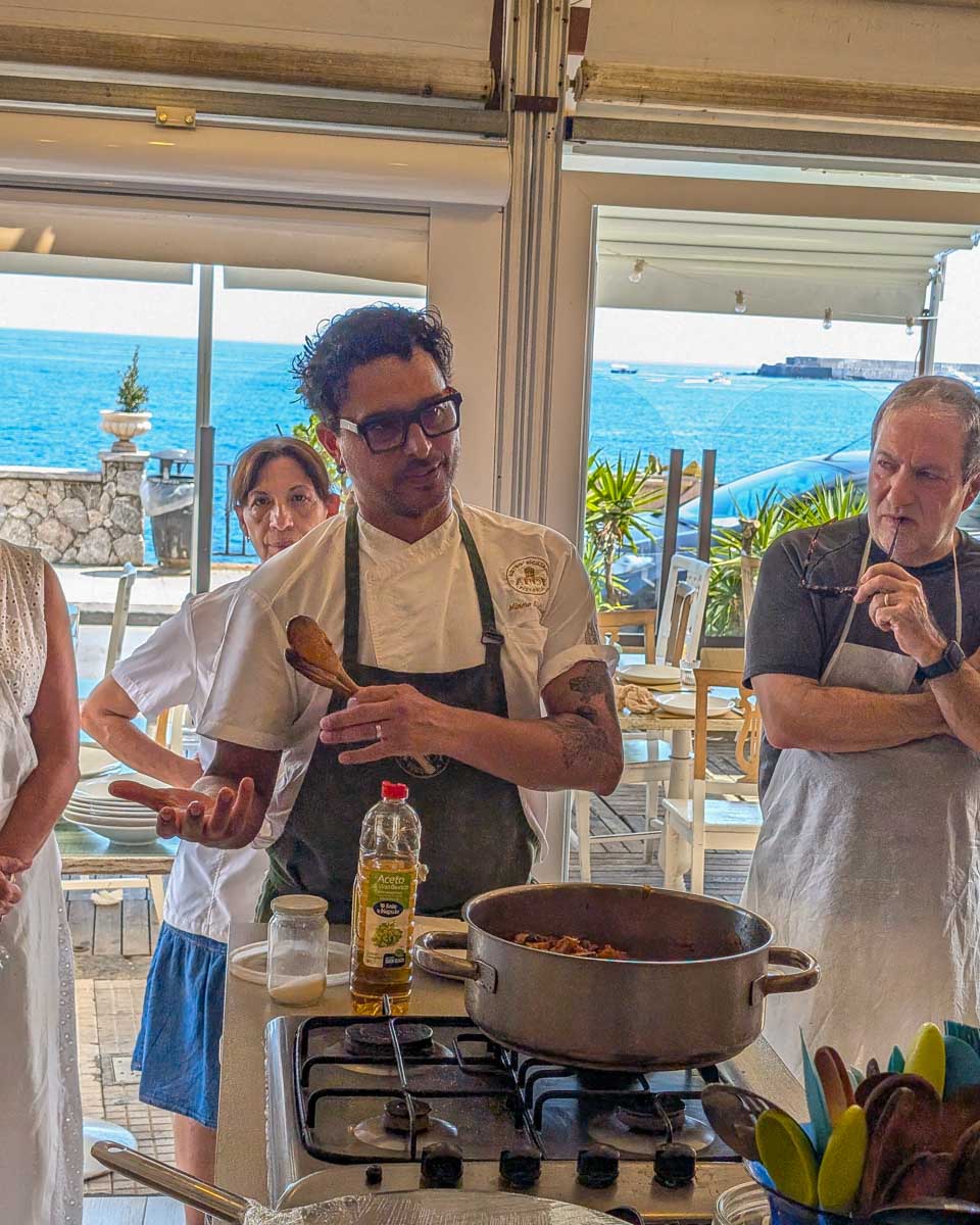 A chef speaks during a cooking class in Taormina Italy
