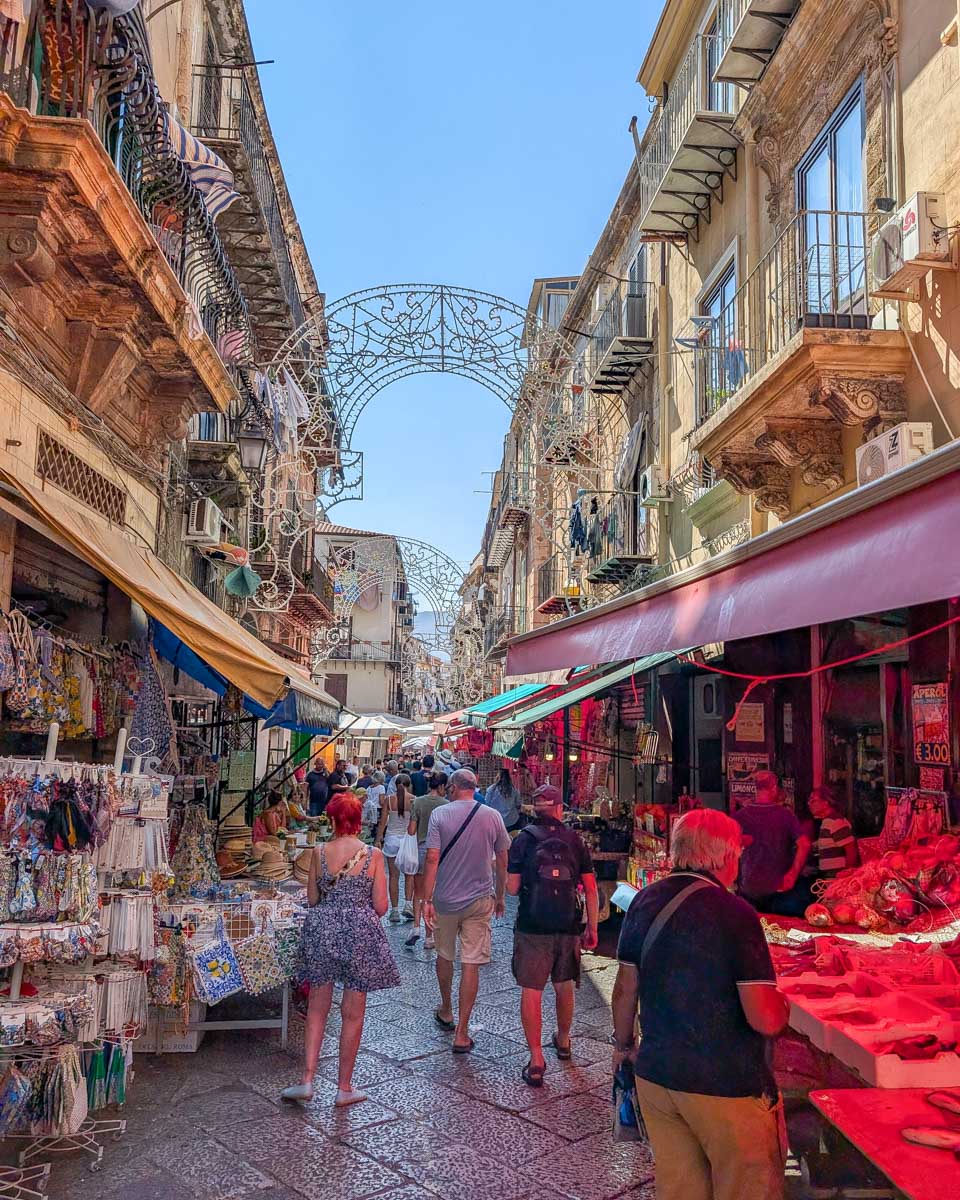 A colorful street seen on a food tour in Palermo Italy