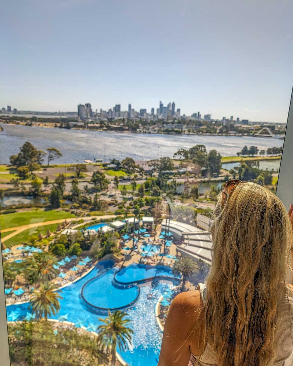 Bailey looks at the pool from room at Crown Towers Perth Australia