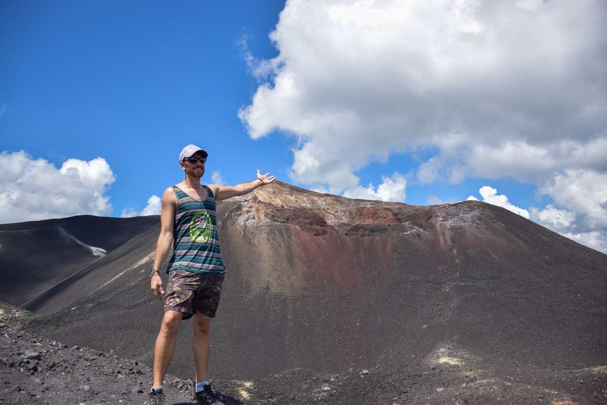 Daniel poses on Cerro Negro while volcano boarding in Nicaragua