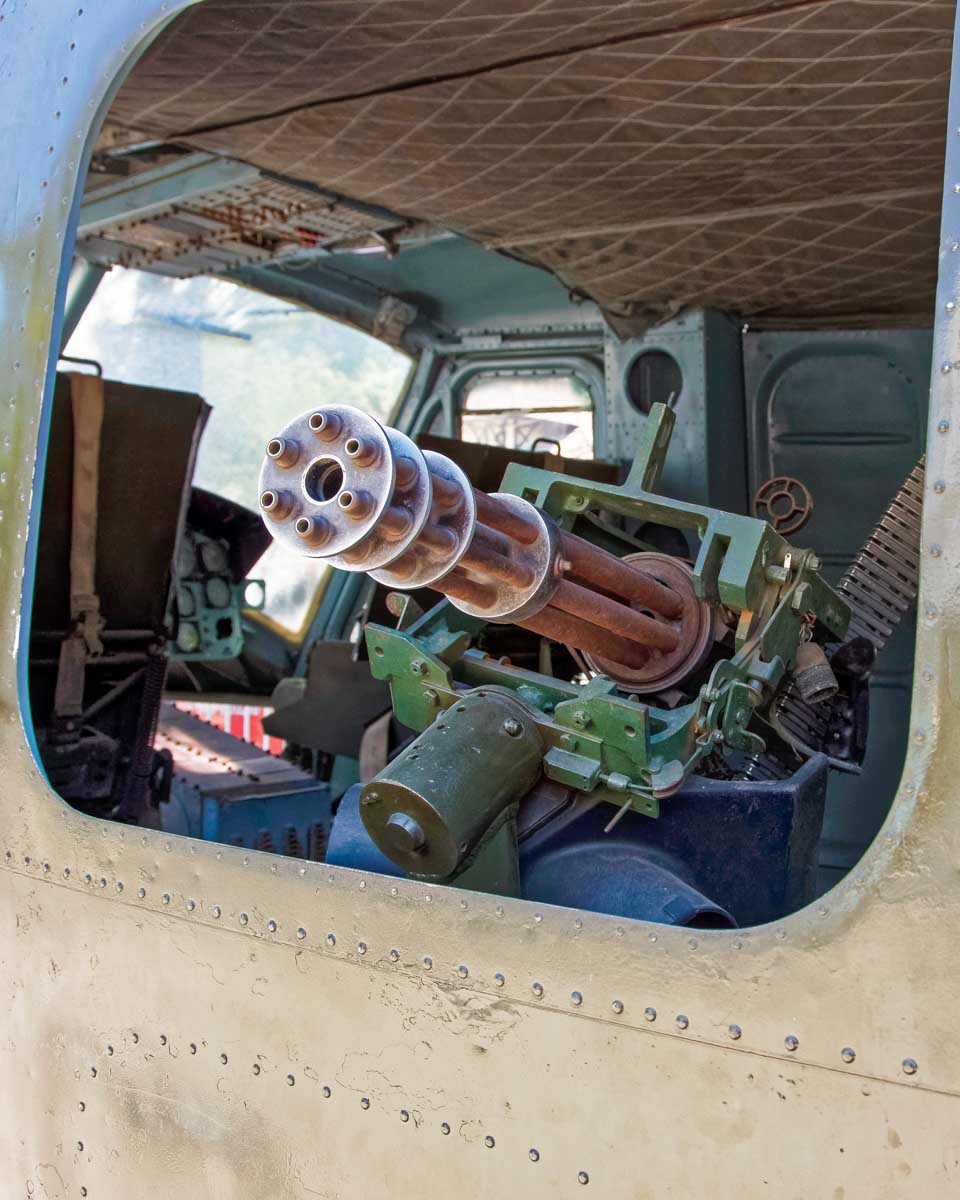 A gun on a Huey helicopter at the War Remnants Museum on a tour in Saigon Ho Chi Minh Vietnam