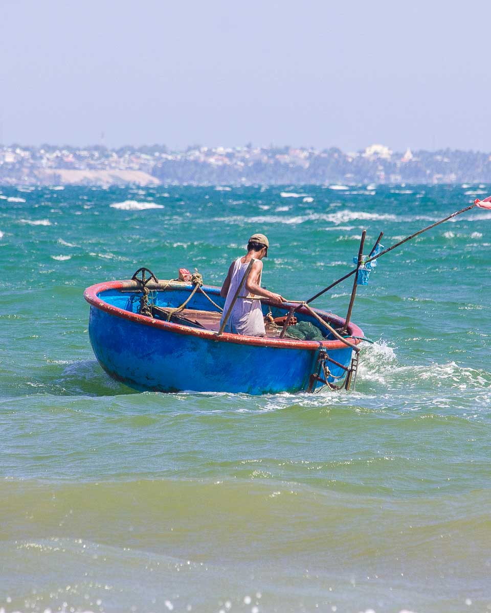 A tub boat in the Ocean in Mui Ne on a tour from Saigon Ho Chi Minh Vietnam