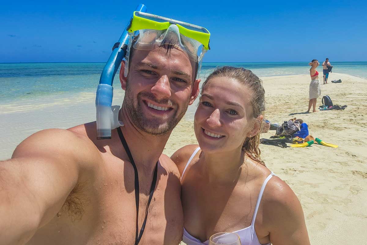 Bailey-and-Daniel-take-a-selfie-on-the beach in Barbados