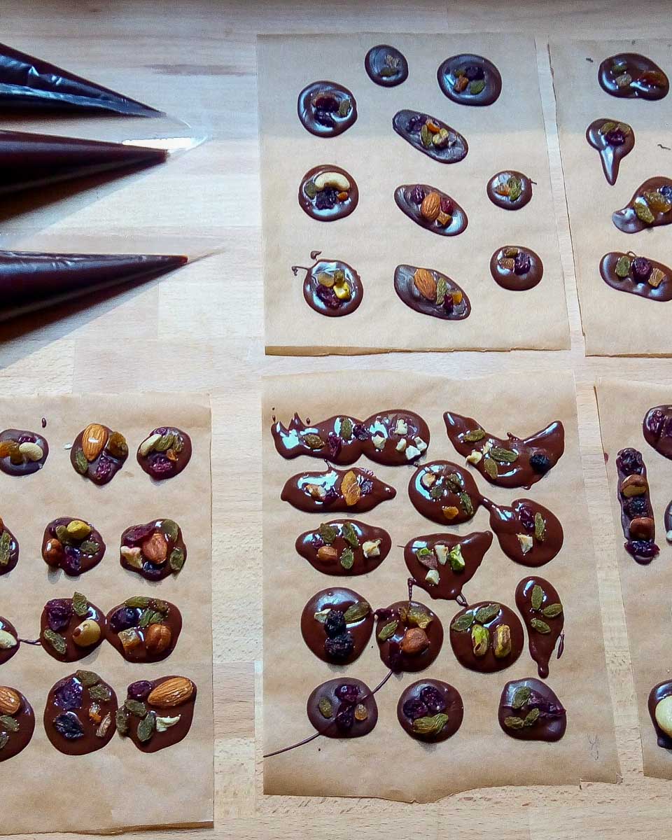 Belgian Chocolate Workshop a person makes chocolate in Brussels Belgium 2