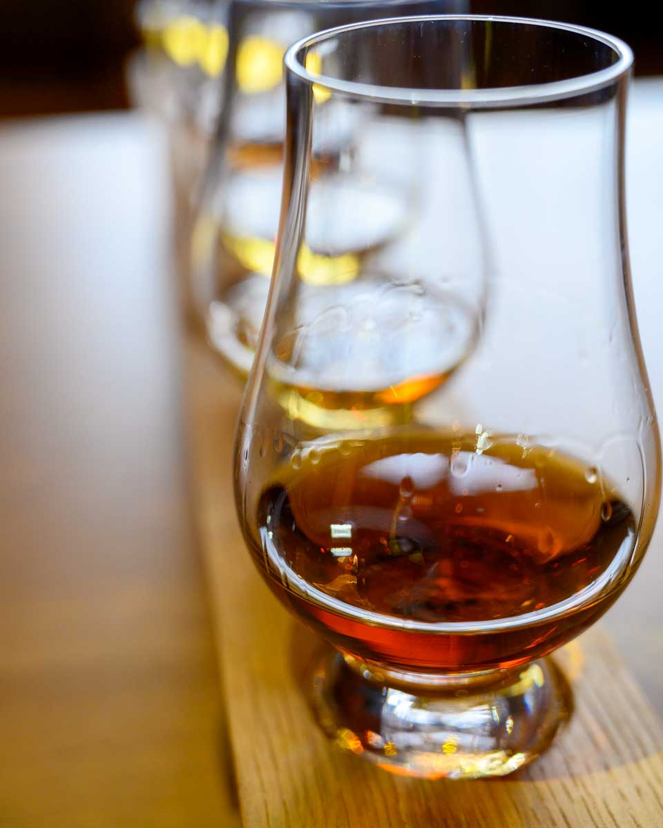 Flight of whiskey on a tour to jack daniels distillery from Nashville Tennessee United states