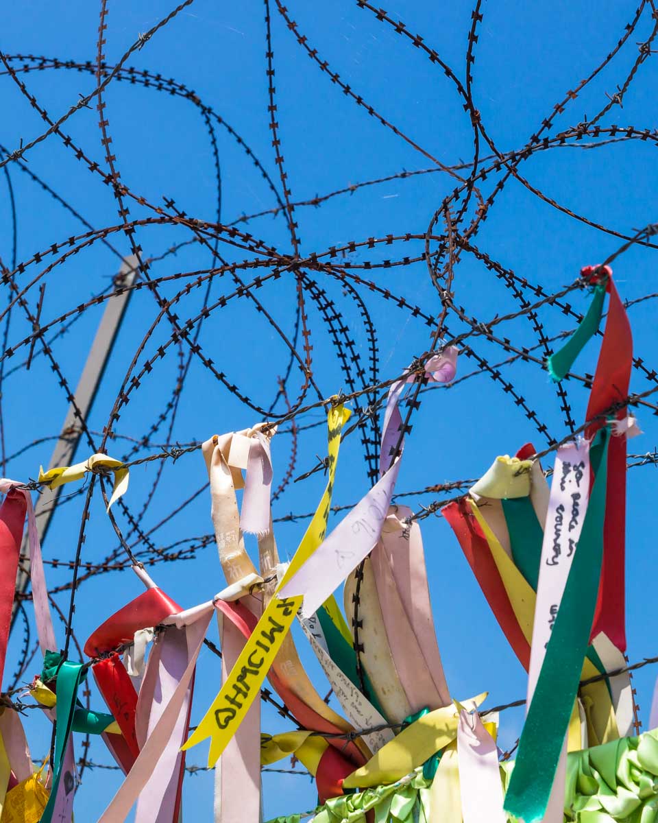 Ribbons on a fence at the DMZ near Seoul South Korea