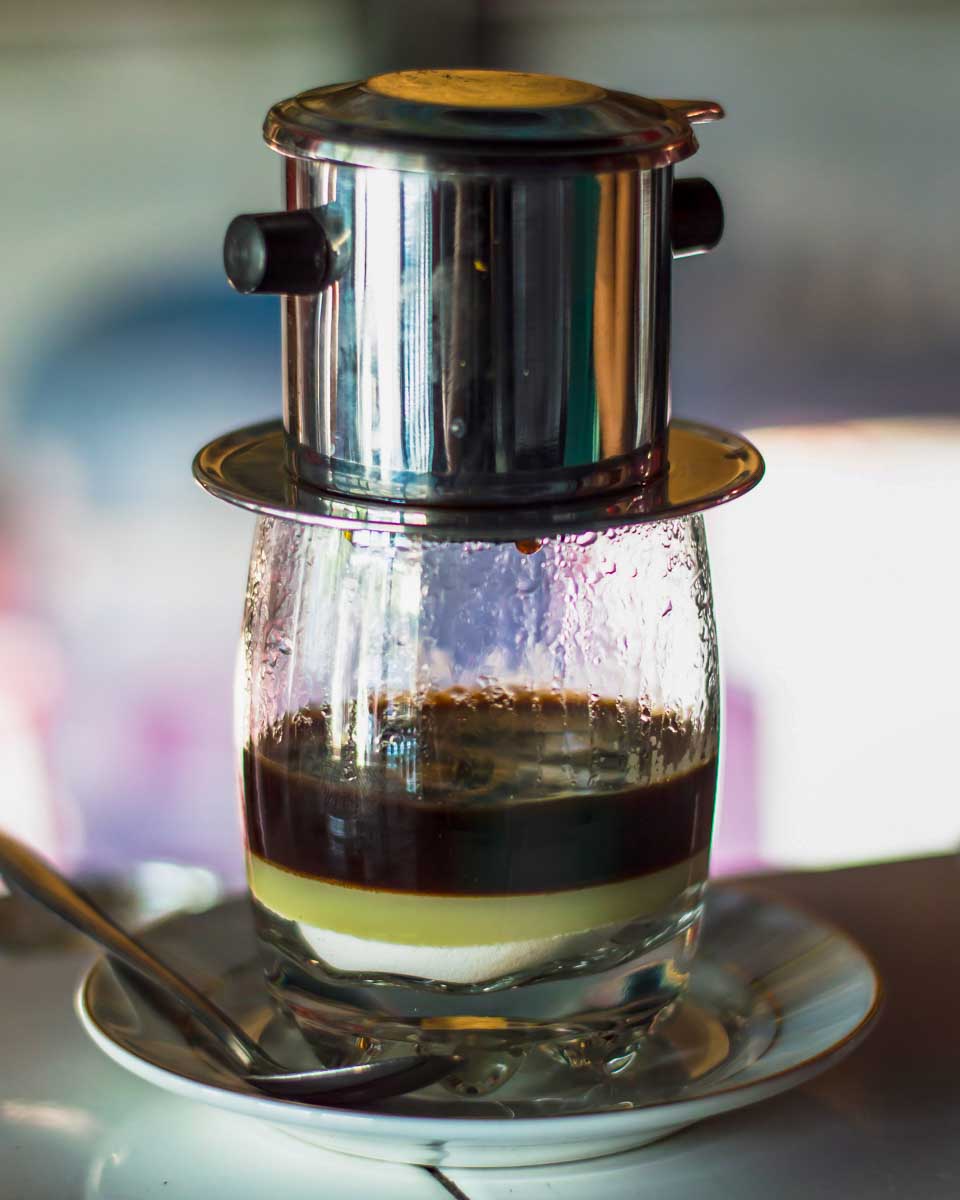 Vietnamese coffee being made on a tour in Hanoi Vietnam