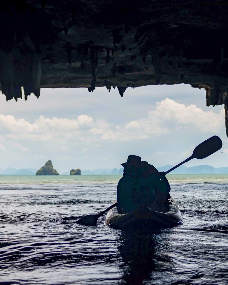 phang nga bay phuket thailand people kayak in a cave