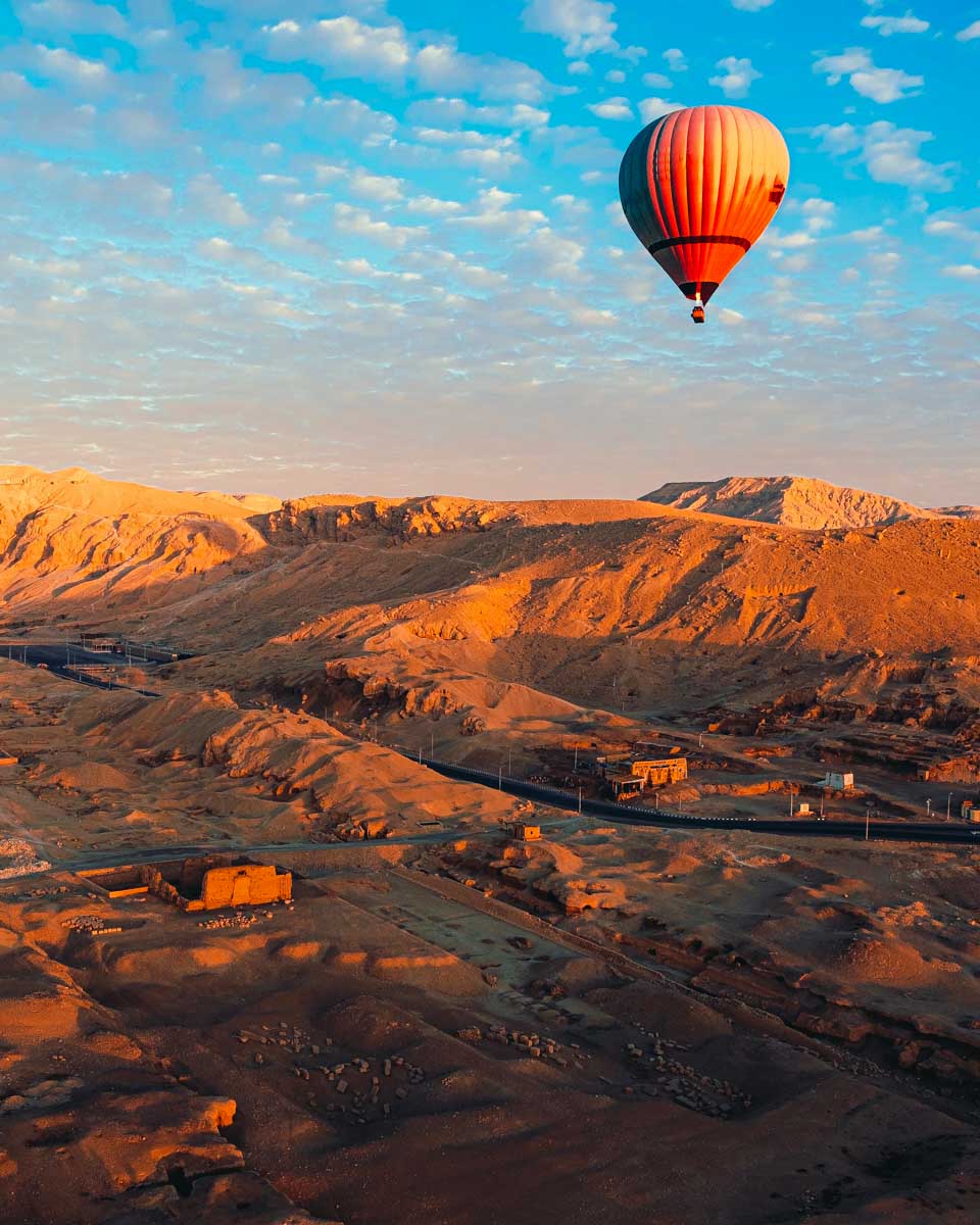A-hot-air-balloon-flies-at-sunrise in Luxor-on-a-cruise-to-Luxor-Egypt