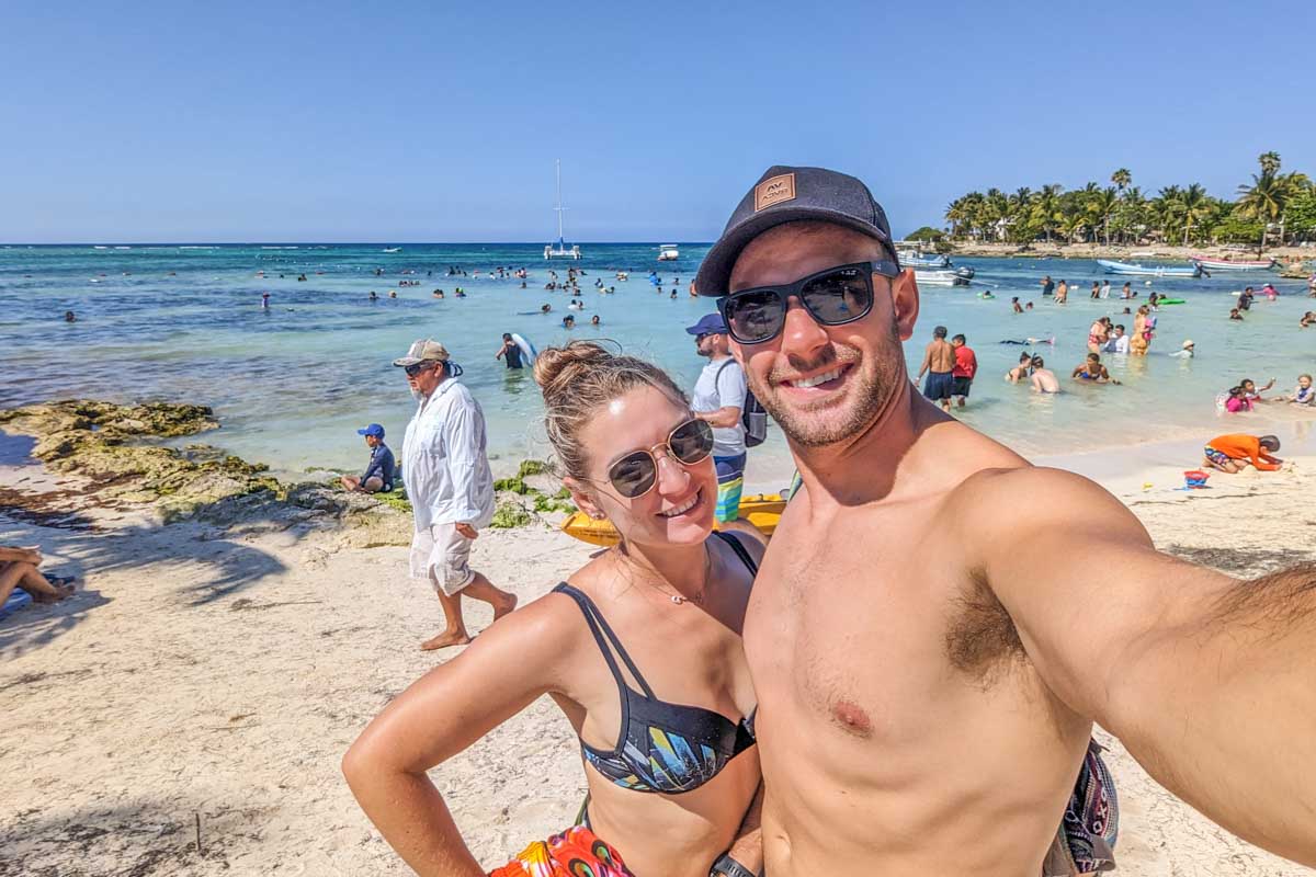 Daniel-and-Bailey-take-a-selfie-at a beach in San Juan Puerto Rico