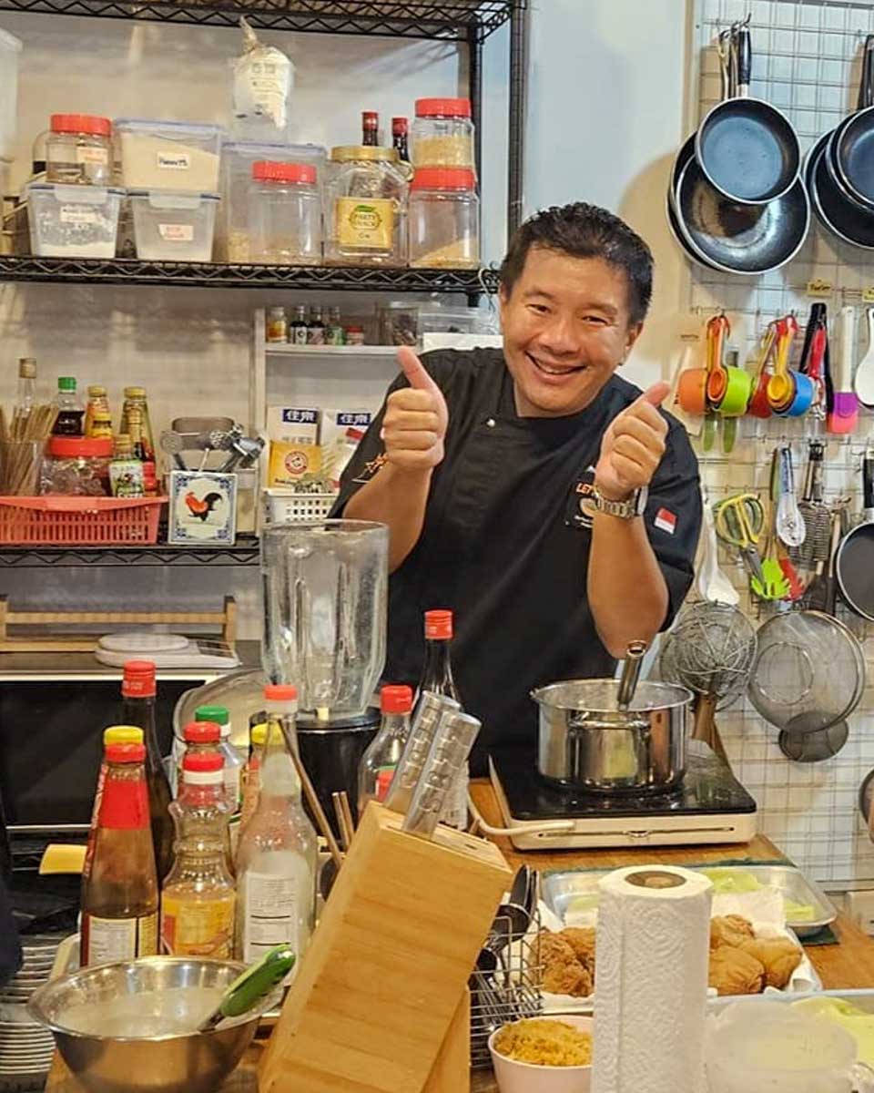 Let's Go Tour Singapore a chef at a cooking class in Singapore