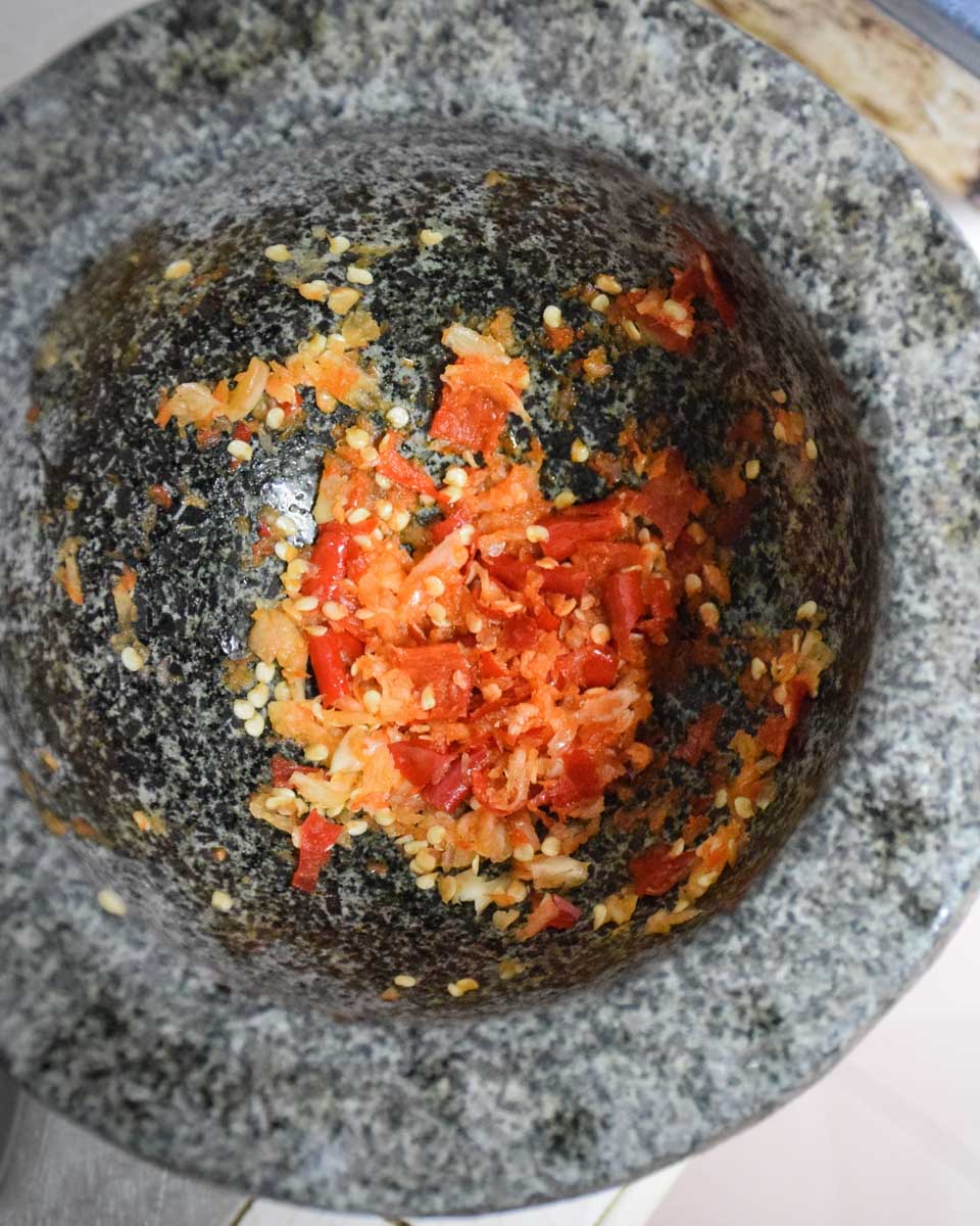 Making curry paste during a cooking class in Kuala Lumpur Malaysia